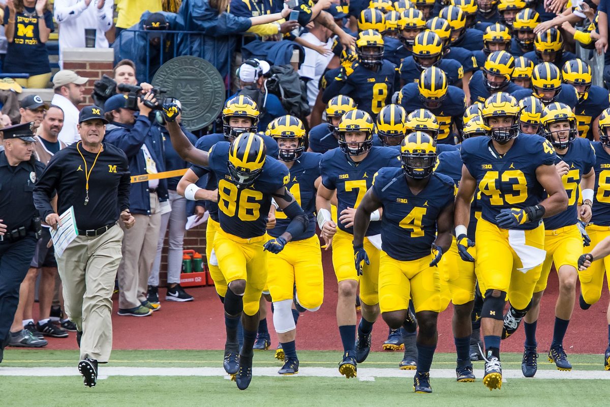 Activision’s Bobby Kotick helps send University of Michigan football team to France